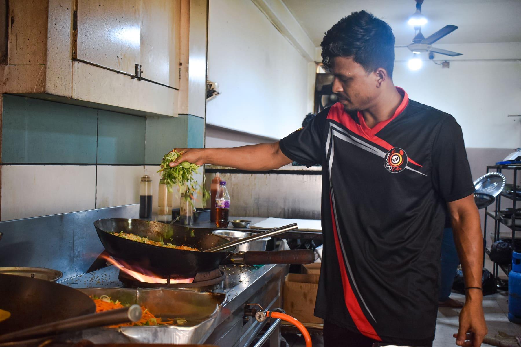 Fresh Leeks Into the Wok — Vegetables go in last so they stay crisp at Food Cabin Galle