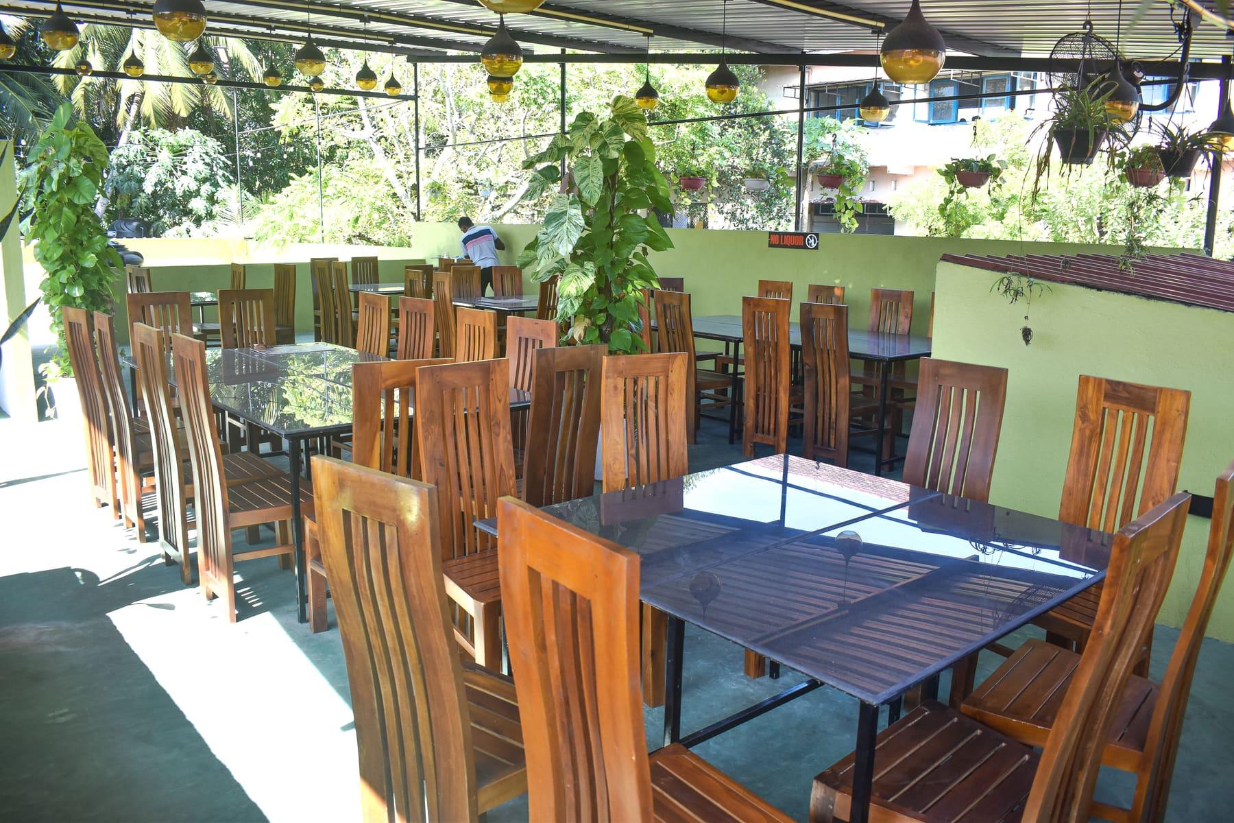 Rooftop Terrace — Open-air seating upstairs at Colombo Road at Food Cabin Galle