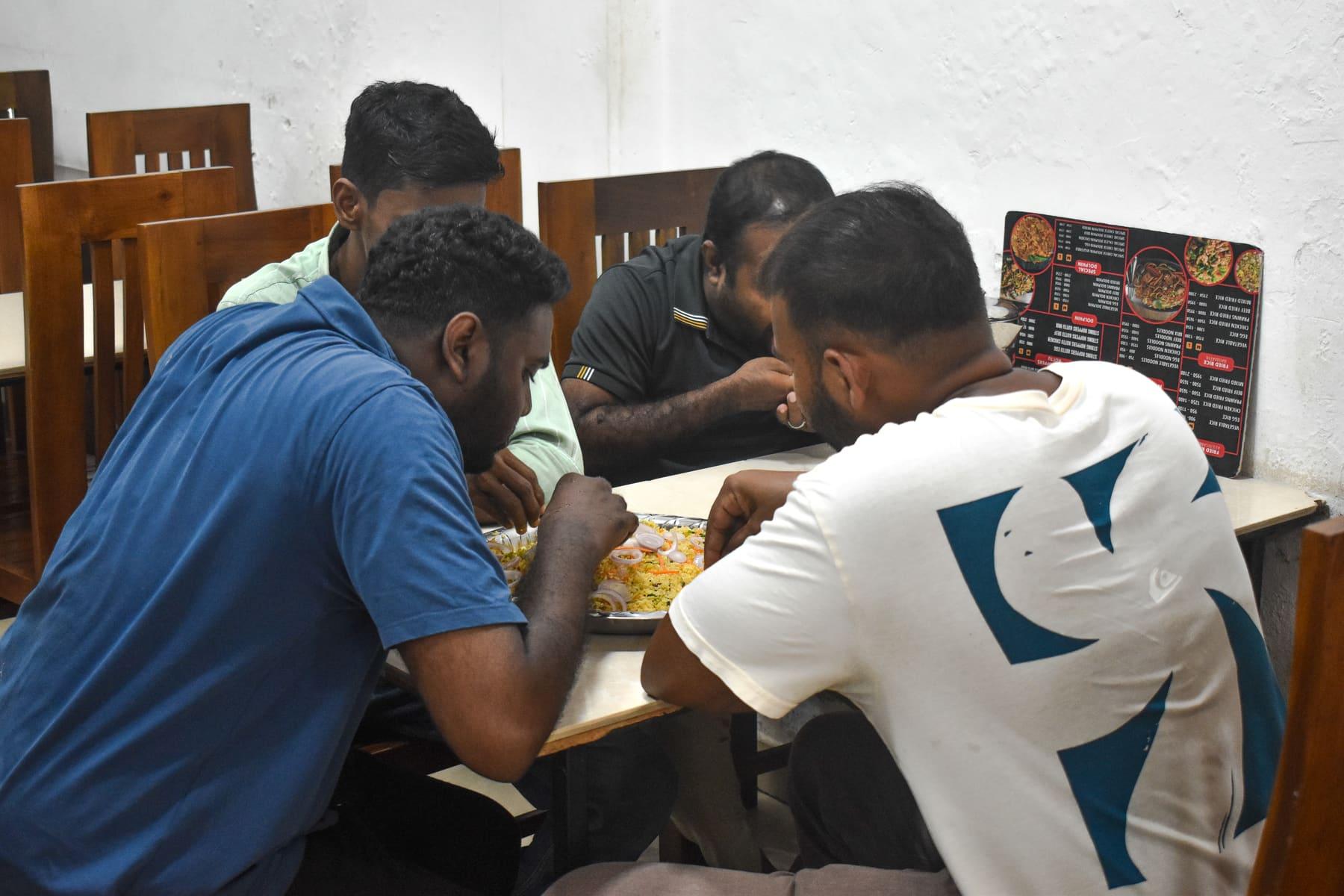 Sharing a Biryani — One big plate, four sets of hands at Food Cabin Galle
